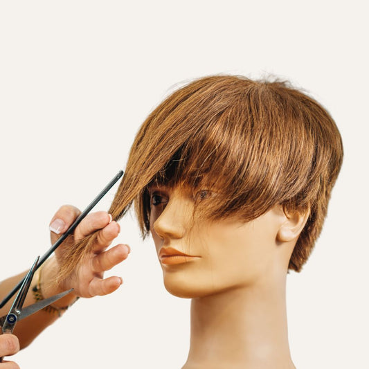 Trendy men's and women's haircut at Ambari Salon Kadavanthra – expert hairstyling at budget-friendly prices. Best haircut salon in Kochi.